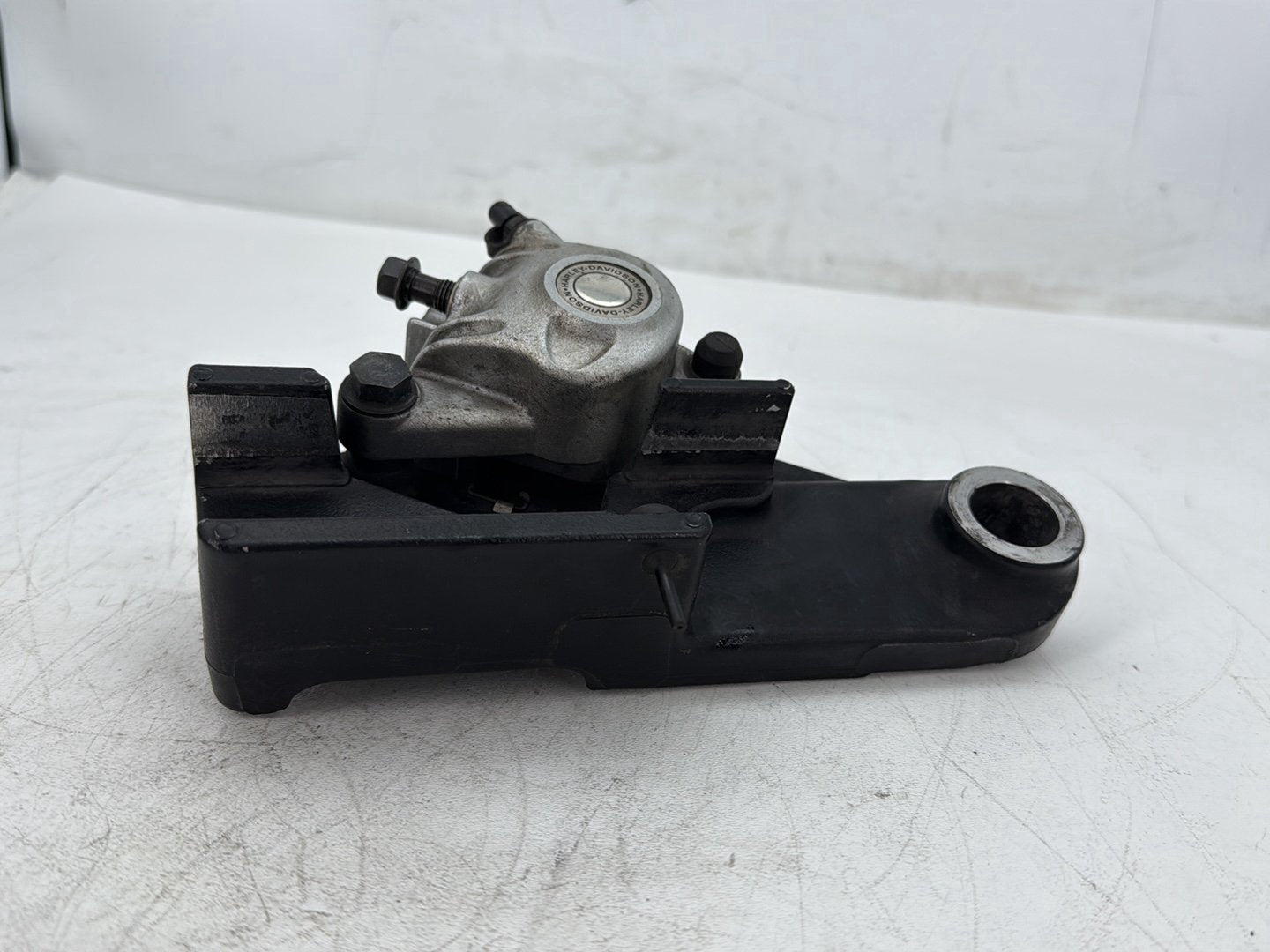 2009 Harley Sportster 883 Low XL883L OEM Rear Back Brake Caliper w/ Bracket