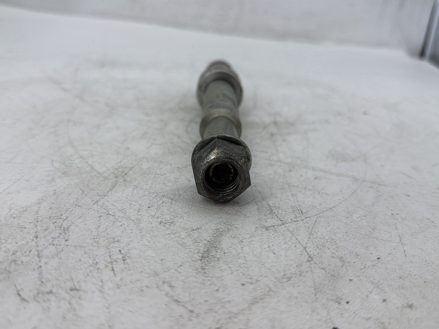 2009 Harley Sportster 883 Low XL883L OEM Front Wheel Axle Bolt Shaft