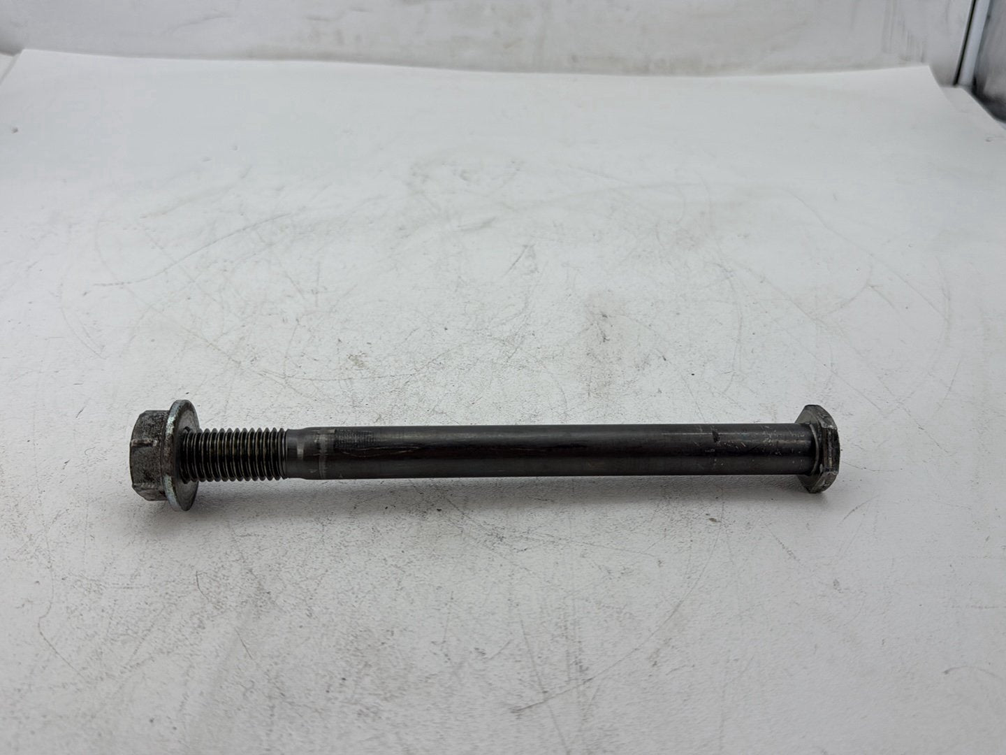 2006 Harley Dyna FXDWGI Wide Glide OEM Rear Fork Swingarm Pivot Bolt Shaft